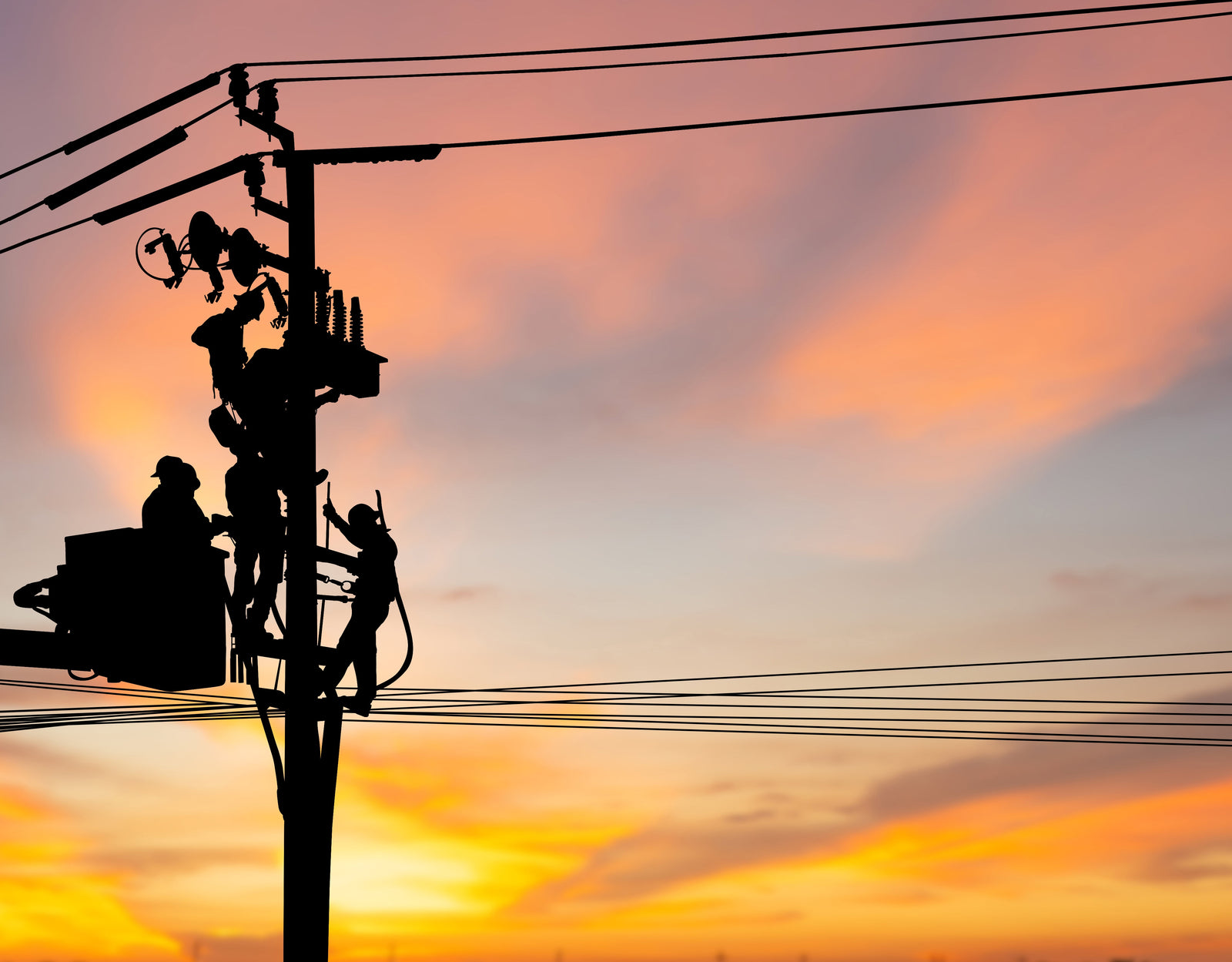 silhouette of a lineman